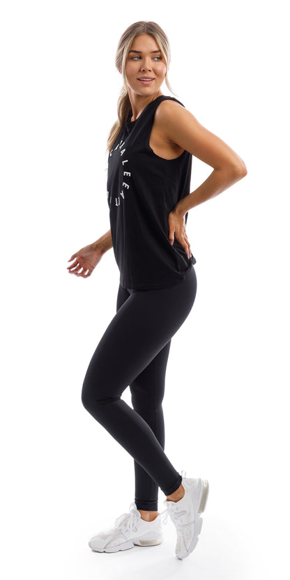 Full body side view of girl in black Midnight CL Active Tank and matching leggings