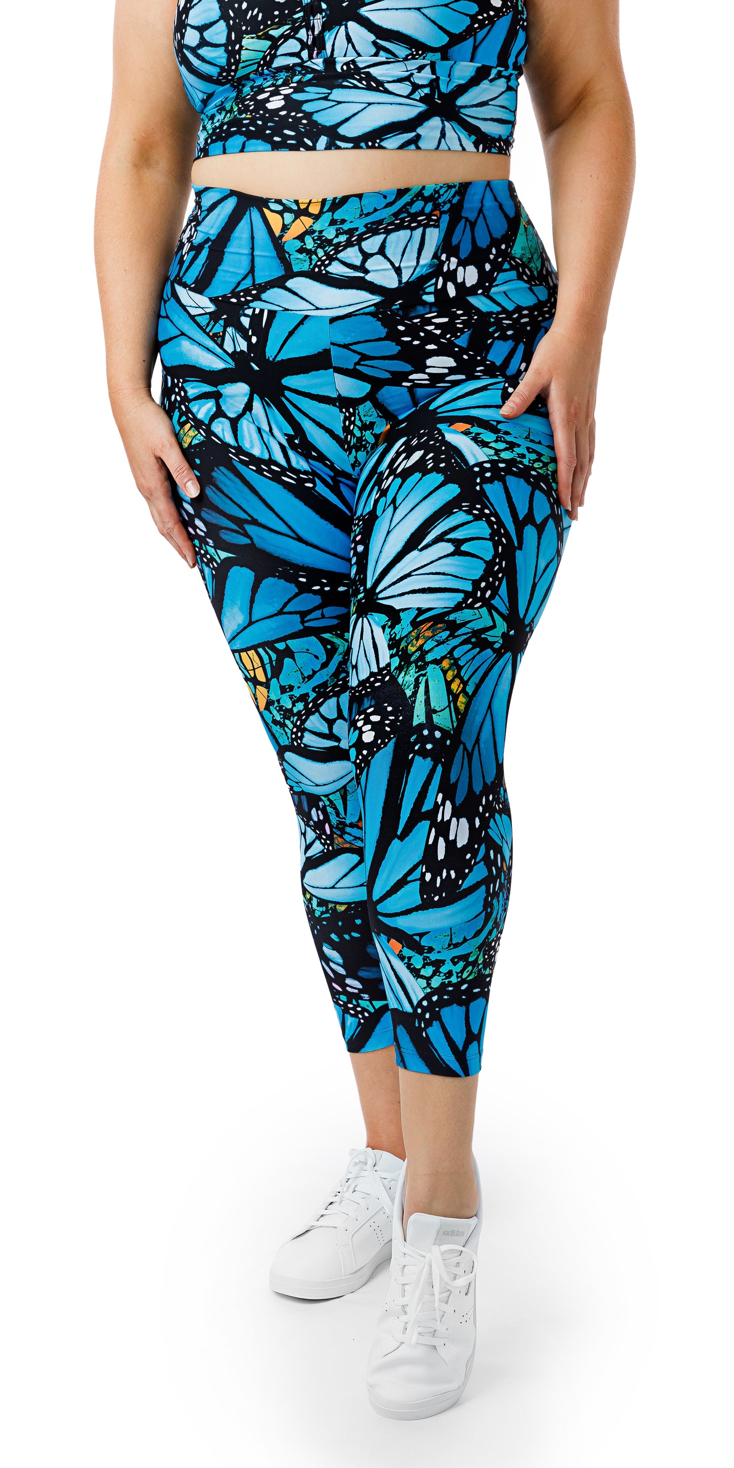 Front view of girl wearing blue animal print JH Butterfly Ultra High Waist 7/8 Leggings