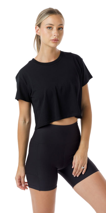 Front view of girl in black Midnight CL Active Crop Tee and matching shorts
