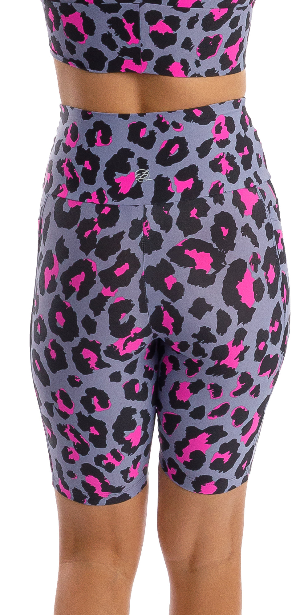 Rear view bottom part of girl in animal print Pink Leopard Eco Biker Shorts with Pockets
