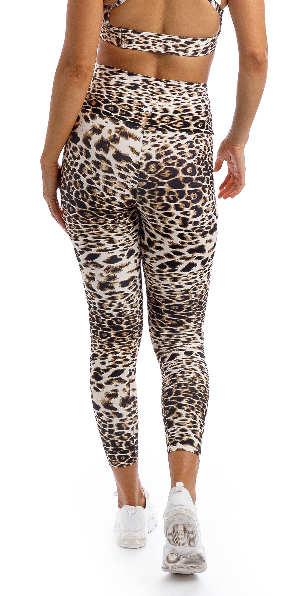 Rear view of girl wearing brown & white cheetah print ultra high waist 7/8 leggings & matching infinity bra