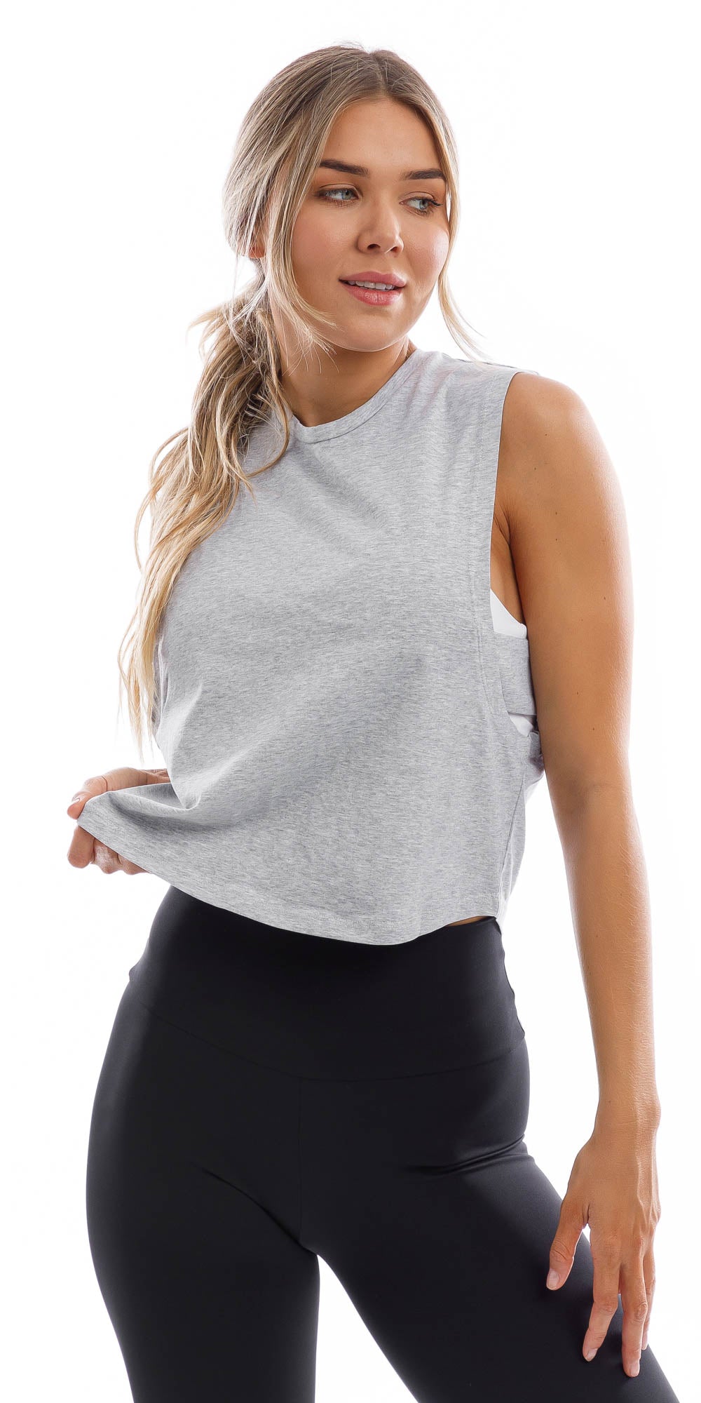 Girl wearing cropped grey Burleigh Tank with side straps & ultra high waist midnight leggings