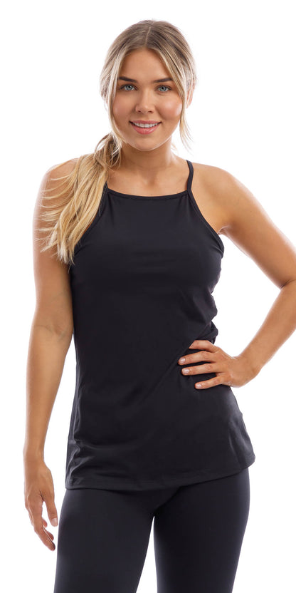 Front view of girl in black Midnight Performance Tank and matching leggings putting one hand on waist