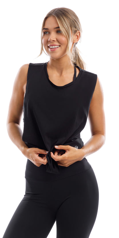 Girl in midnight Lennox Tank with open cut out back & matching ultra high waist leggings