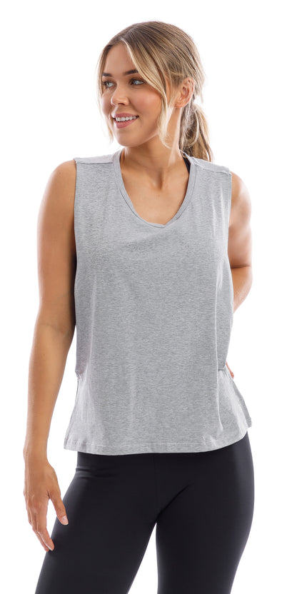 Girl in grey Lennox Tank with open cut out back & ultra high waist midnight leggings