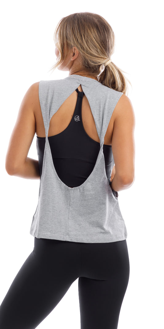 Girl in grey Lennox Tank with open cut out back & ultra high waist midnight leggings