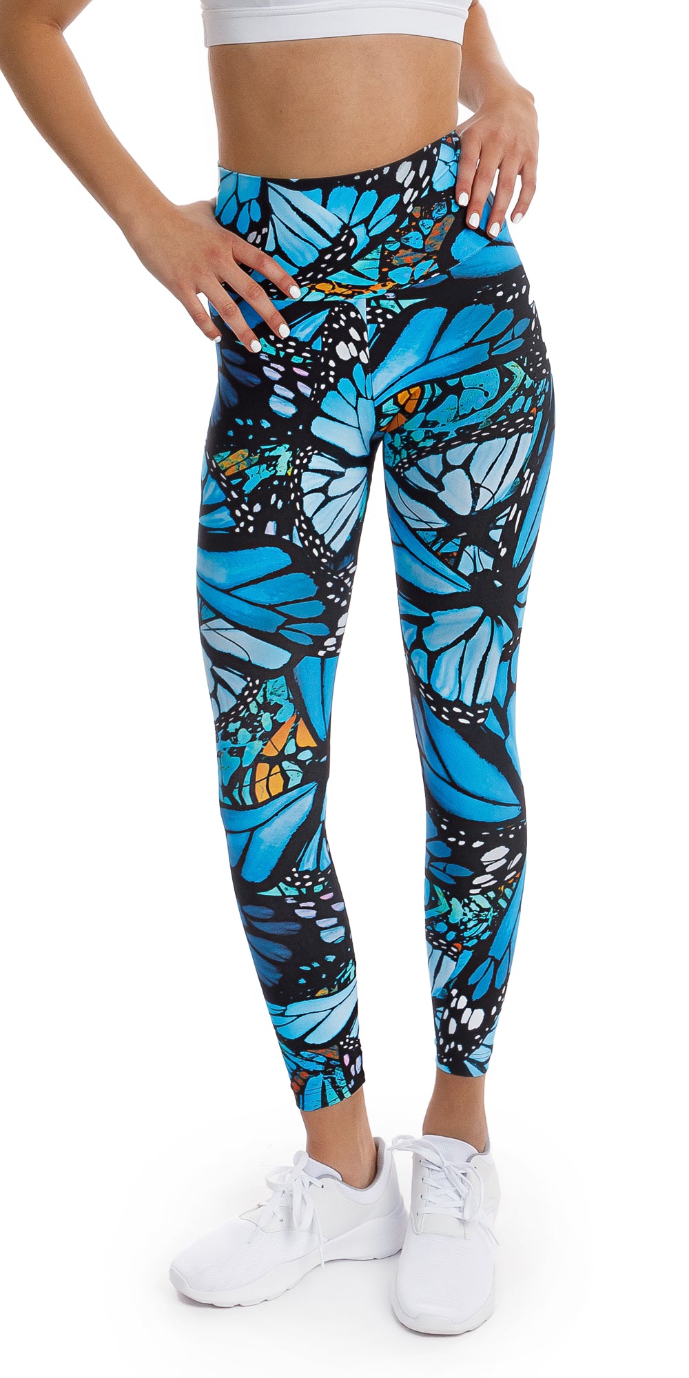 Front view bottom part of girl teenager in blue and black animal print Tween JH Butterfly Ultra High Waist 7/8 Leggings putting both hands on waist