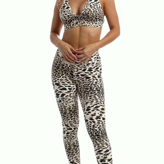 Video of girl wearing brown & white cheetah print products